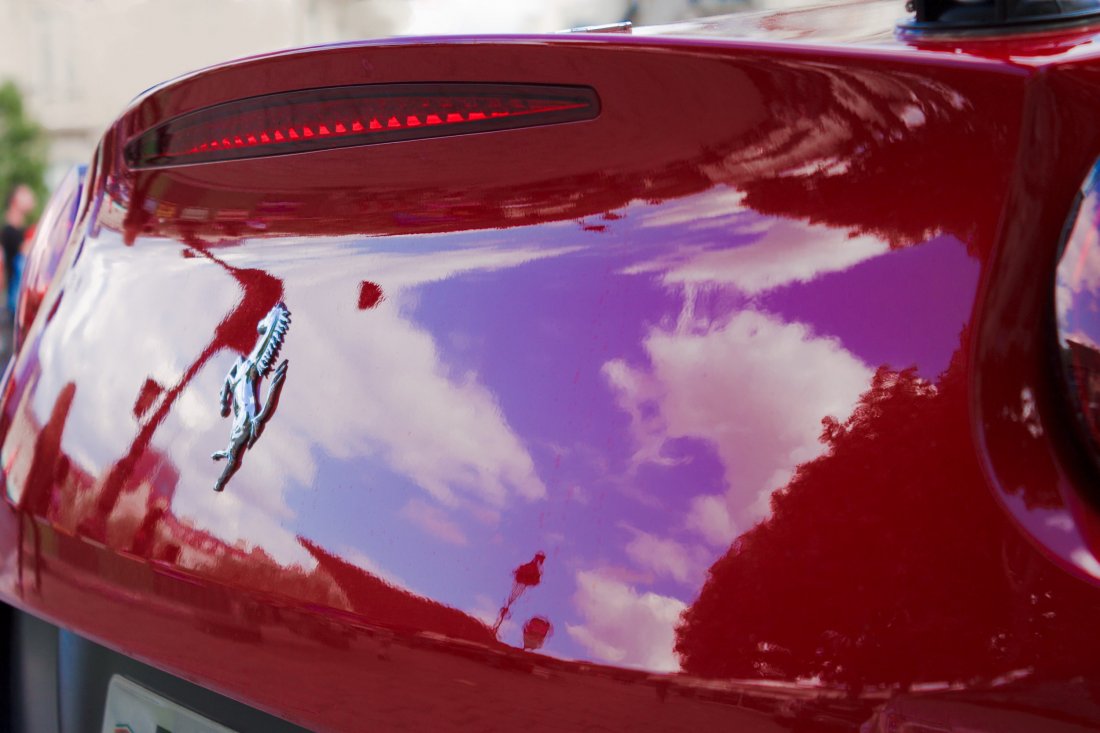 Ferrari reflecting the clouds